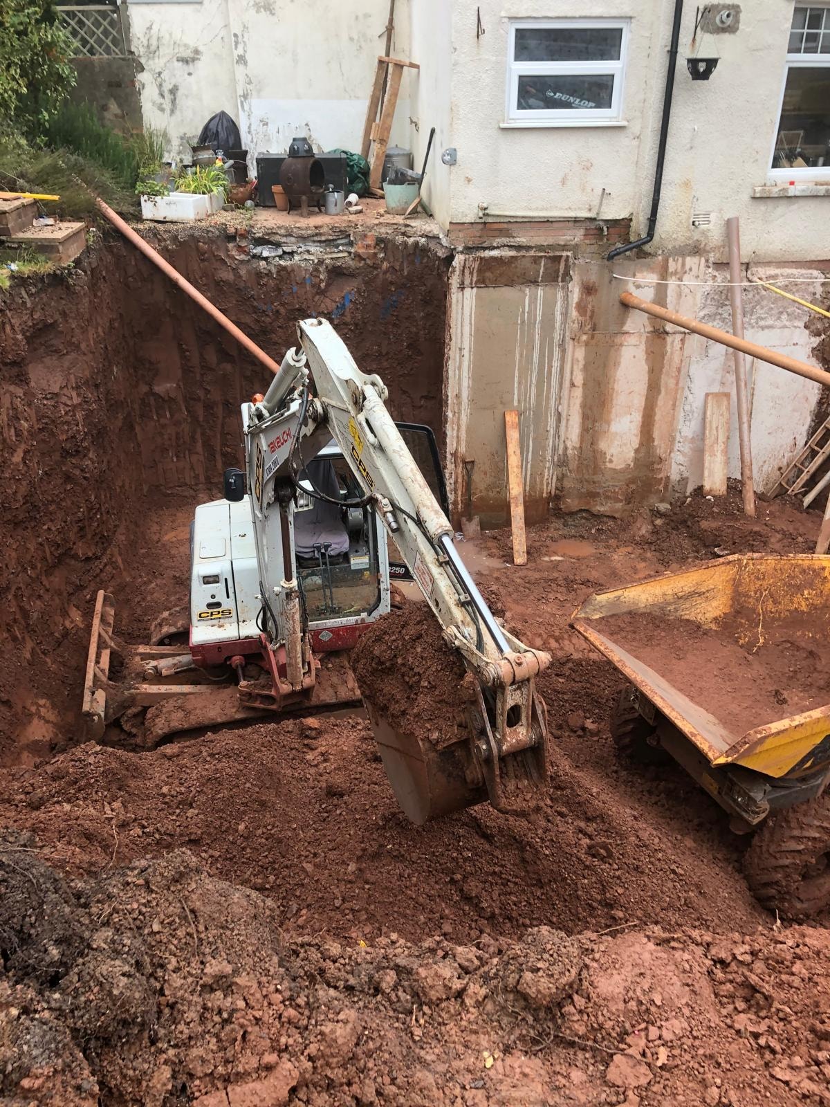 Foundation excavation during underpinning work